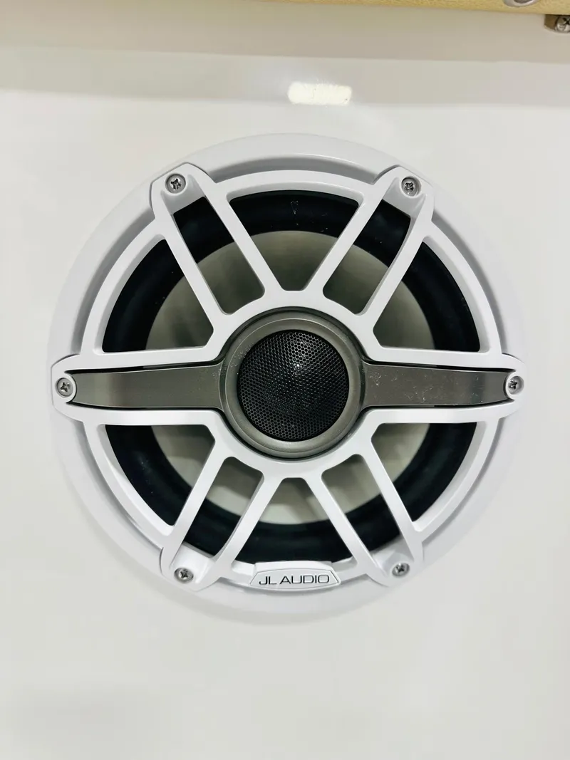 Slide: The Image of JL Audio speaker on 2025 Sportsman Open 282 Center Console boat. - 17
