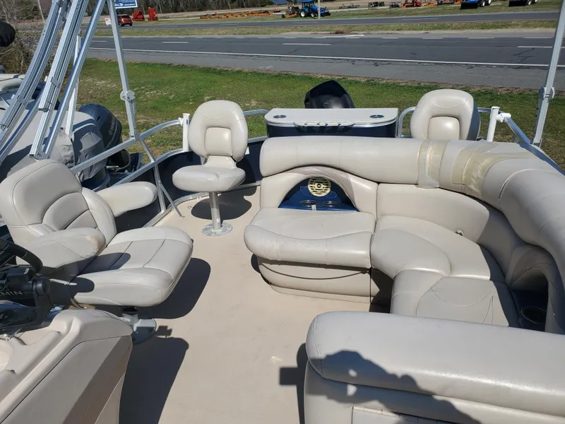 Slide: The Image of 2012 Starcraft Stardeck 206 4PT boat with spacious seating and modern design. - 2