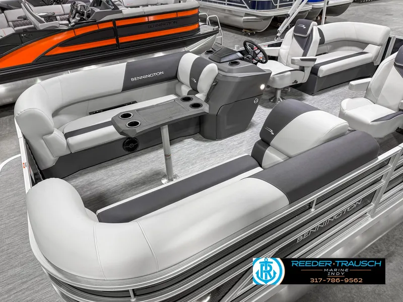 Slide: The Image of 2025 Bennington 20 SSR pontoon boat interior with seating and console. - 12