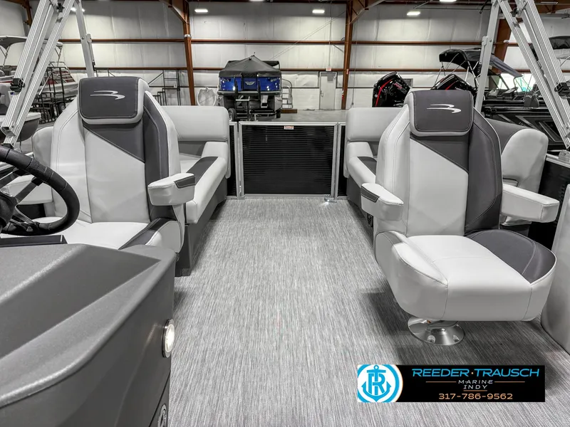 Slide: The Image of 2025 Bennington 20 SSR pontoon boat interior with gray seating and modern design. - 17