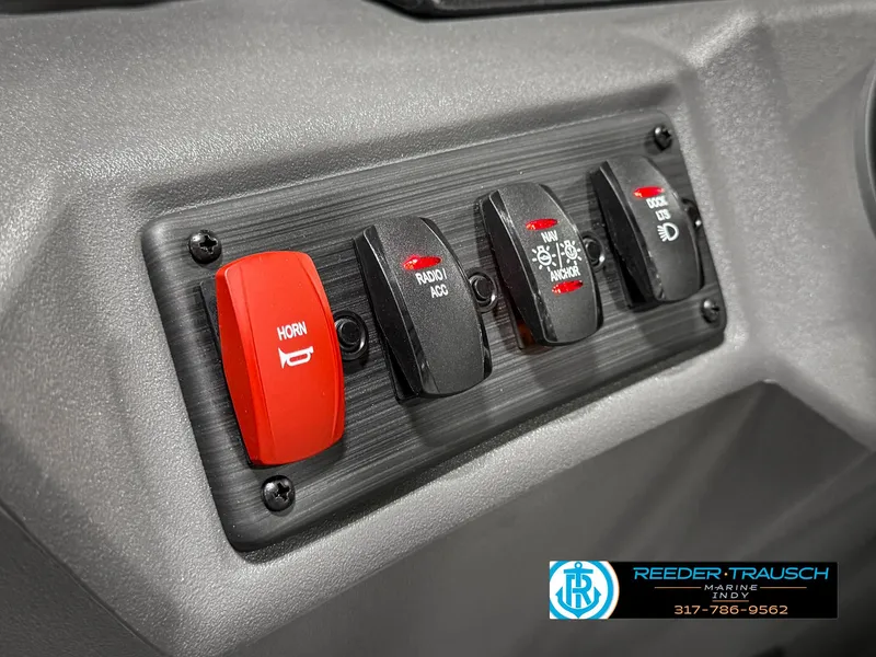 Slide: The Image of Control panel of 2025 Bennington 20 SSR boat with switches and horn button. - 31