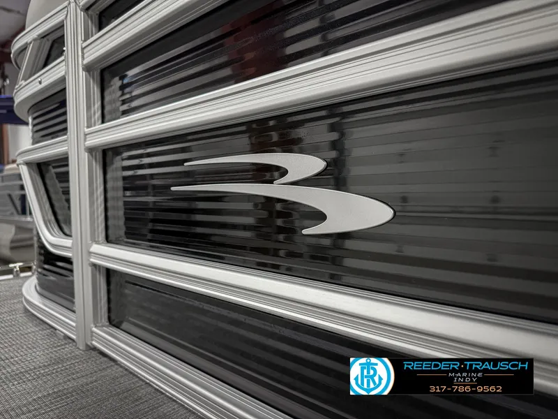 Slide: The Image of 2025 Bennington 20 SSR boat detail with sleek black and silver design. - 43