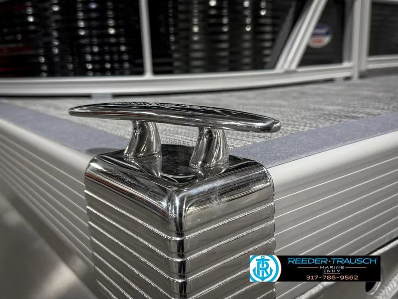 Slide: The Image of 2025 Bennington 20 SSR boat cleat detail with Reeder-Trausch Marine logo. - 47