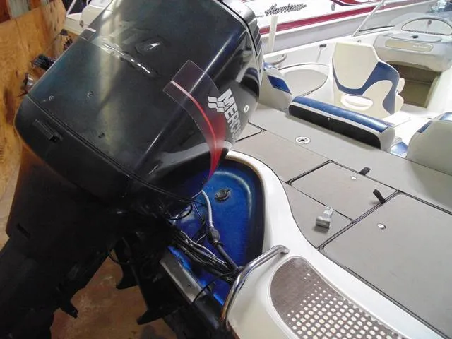 Slide: The Image of 2002 Nitro 188 Fish And Ski boat with Mercury outboard motor, interior view. - 5