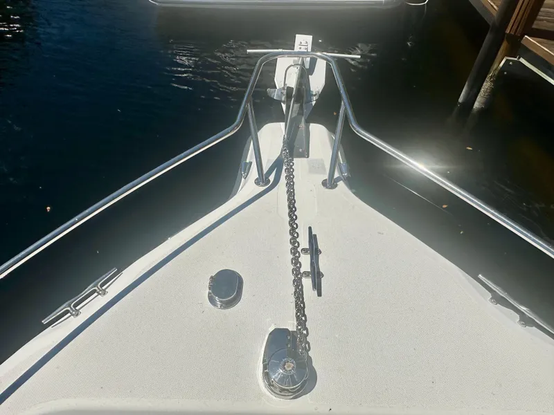 Slide: The Image of Bow of 2005 Century 3200 Center Console with anchor chain and railing. - 21