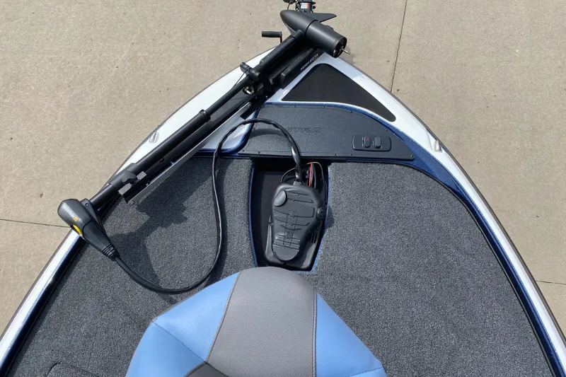 Slide: The Image of 2025 Nitro Z17 boat deck with trolling motor and blue-gray seat. - 3