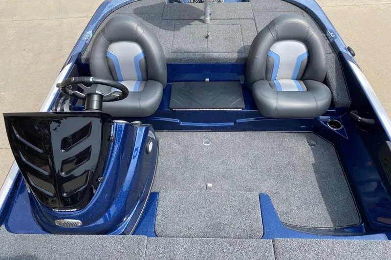 Slide: The Image of 2025 Nitro Z17 boat interior with dual seats and steering console. - 4
