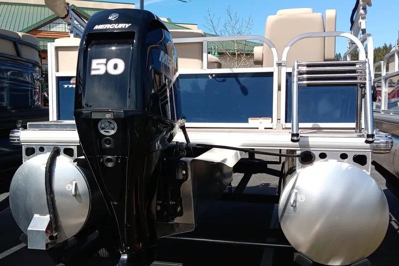 Slide: The Image of 2025 Sun Tracker Bass Buggy 16 XL Select pontoon boat with Mercury 50 engine. - 4