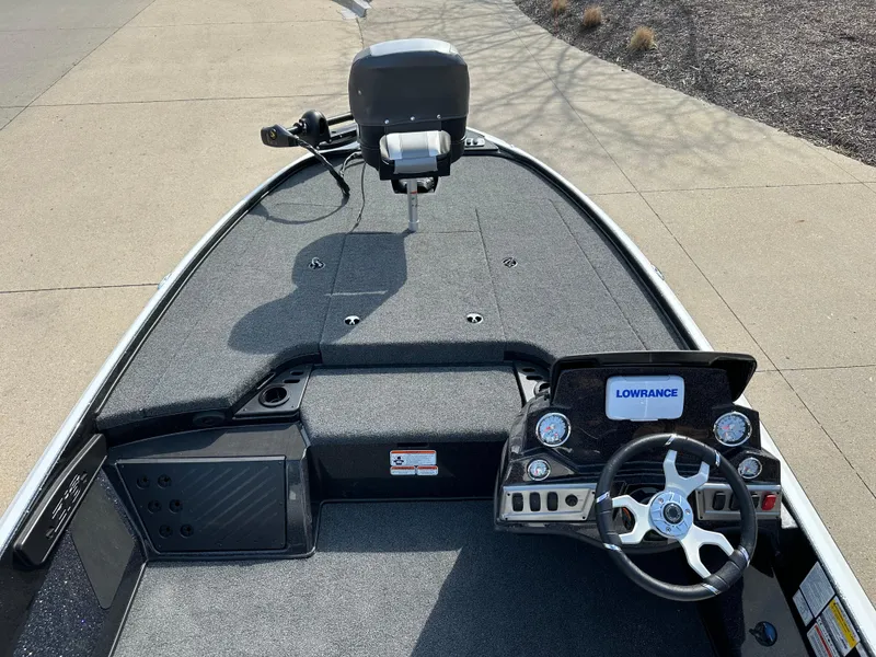 Slide: The Image of 2025 Nitro Z18 boat interior with steering wheel and Lowrance display. - 4