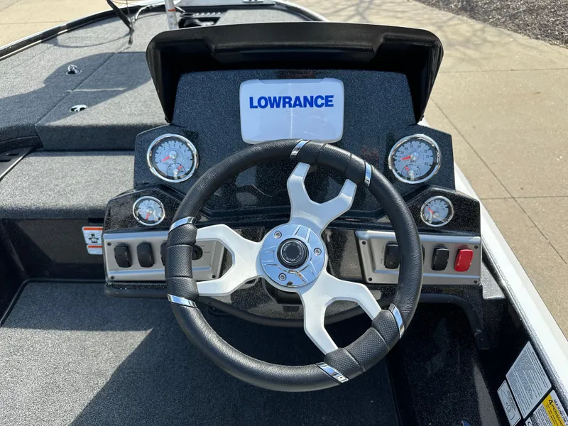 Slide: The Image of Steering wheel and dashboard of 2025 Nitro Z18 boat with Lowrance display. - 5