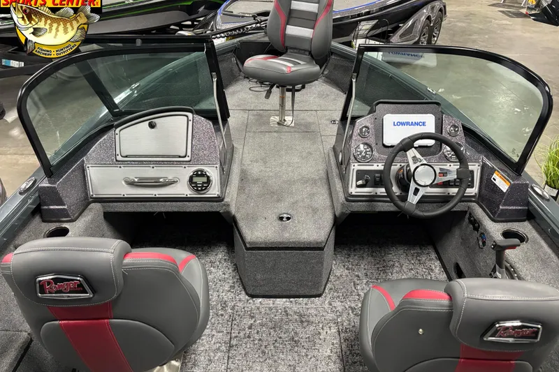 Slide: The Image of 2025 Ranger VS1882SC Reata boat interior with steering console and seating. - 5