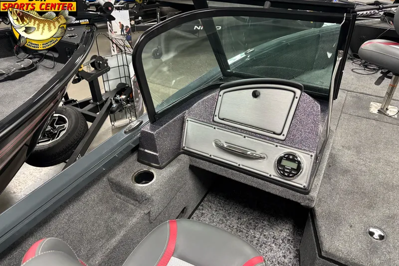 Slide: The Image of 2025 Ranger VS1882SC Reata boat interior with console and seating, displayed at Sports Center. - 7