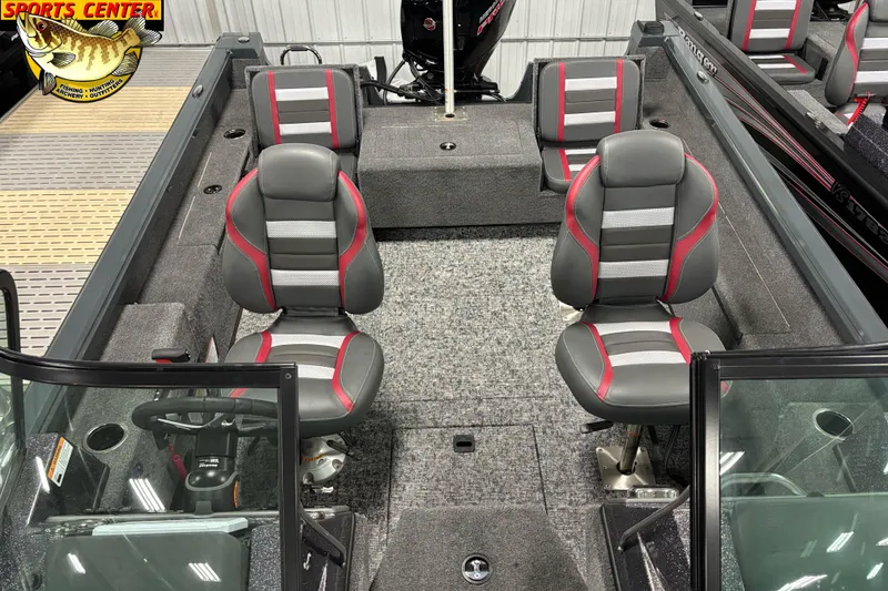 Slide: The Image of 2025 Ranger VS1882SC Reata boat interior with gray and red seating, steering wheel, and carpeted floor. - 8