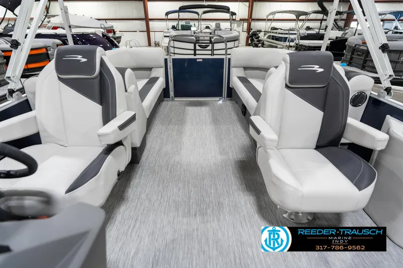Slide: The Image of 2025 Bennington 22 SSR pontoon boat interior with modern seating and sleek design. - 17