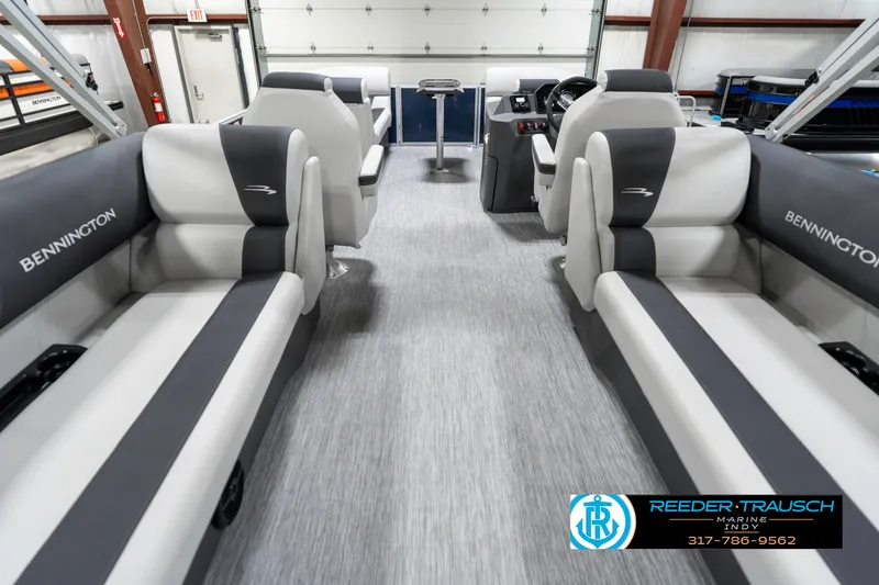 Slide: The Image of 2025 Bennington 22 SSR pontoon boat interior with gray seating and modern design. - 19