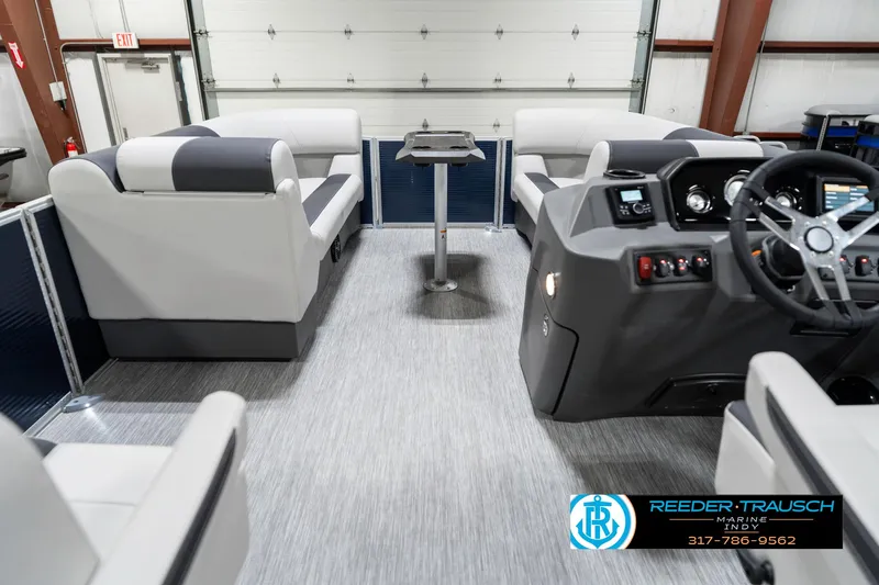 Slide: The Image of Interior of 2025 Bennington 22 SSR pontoon boat with modern seating and control console. - 20
