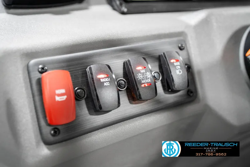 Slide: The Image of Control panel of 2025 Bennington 22 SSR boat with labeled switches. - 31