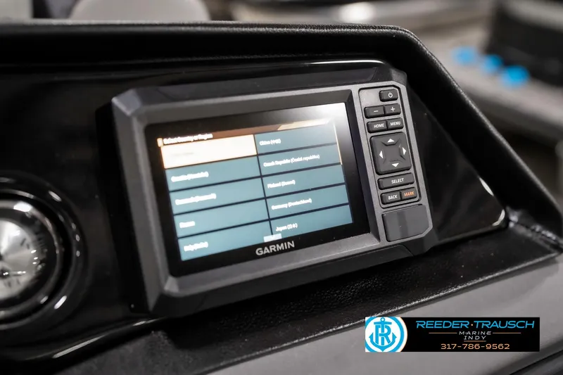 Slide: The Image of Garmin display on 2025 Bennington 22 SSR boat dashboard, featuring navigation controls. - 34