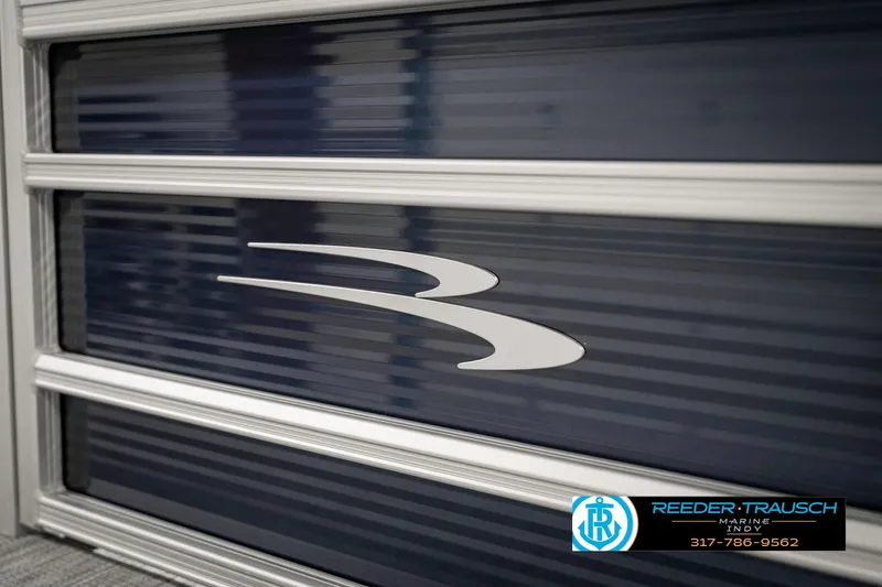 Slide: The Image of 2025 Bennington 22 SSR boat panel with logo, featuring sleek design and branding. - 47