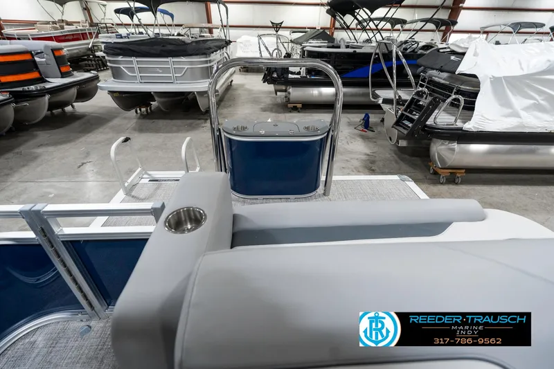 Slide: The Image of 2025 Avalon 1785 Venture CRB pontoon boat in showroom, featuring sleek design and modern amenities. - 17