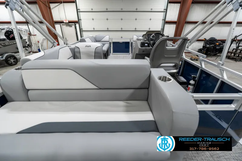 Slide: The Image of 2025 Avalon 1785 Venture CRB pontoon boat interior with gray seating and modern design. - 18