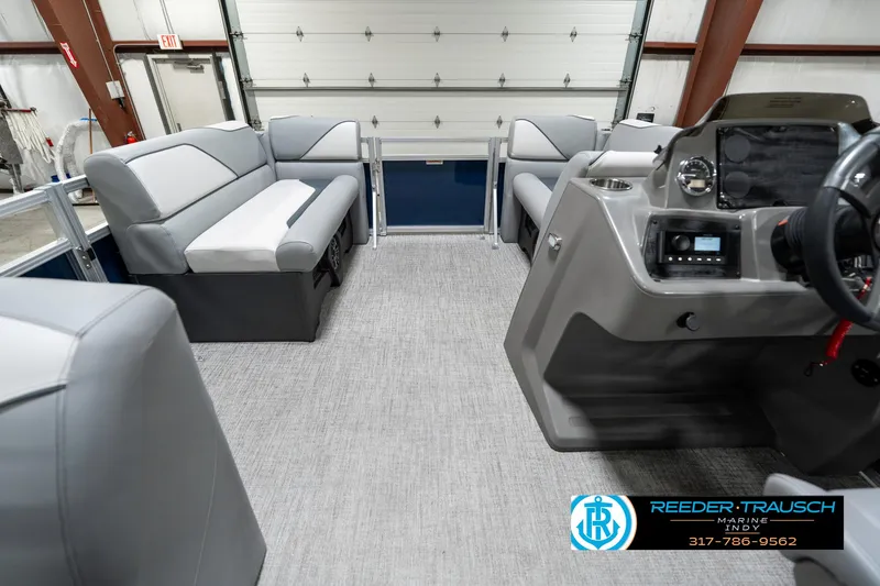 Slide: The Image of Interior of 2025 Avalon 1785 Venture CRB pontoon boat with modern seating and control console. - 19