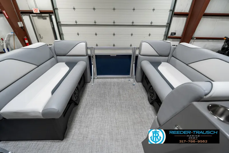 Slide: The Image of 2025 Avalon 1785 Venture CRB interior with gray seating in a showroom. - 20