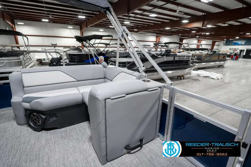 Slide: The Image of 2025 Avalon 1785 Venture CRB pontoon boat interior with gray seating in showroom. - 22
