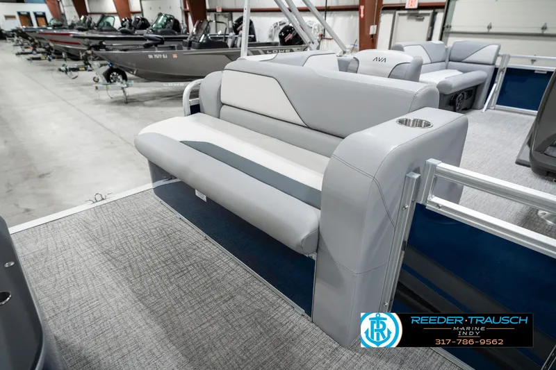 Slide: The Image of 2025 Avalon 1785 Venture CRB boat interior with gray seating in showroom. - 26
