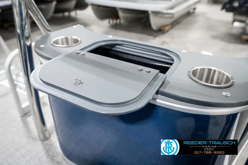 Slide: The Image of 2025 Avalon 1785 Venture CRB boat with cup holders and storage compartment. - 29