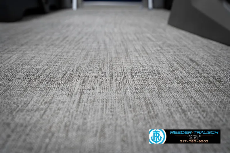 Slide: The Image of Carpet flooring inside 2025 Avalon 1785 Venture CRB boat, featuring textured gray design. - 48