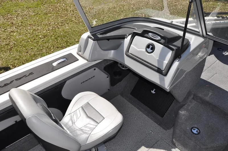 Slide: The Image of 2019 Tracker Targa V-19 Combo Tournament Edition boat interior with seating and dashboard. - 11