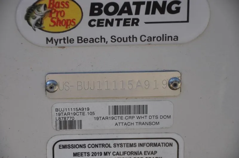 Slide: The Image of Sticker and plate details on a 2019 Tracker Targa V-19 Combo boat. - 13