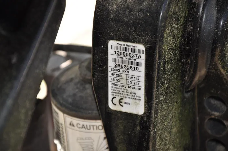 Slide: The Image of Label on Mercury Marine engine, showing model and serial numbers, attached to 2019 Tracker Targa V-19 Combo. - 14