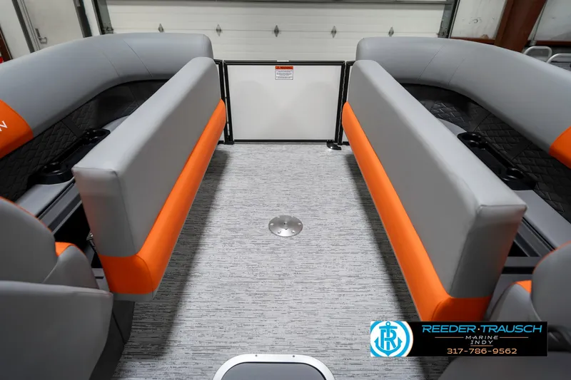 Slide: The Image of 2025 Bennington 21 SSR boat interior with gray and orange seating. - 22