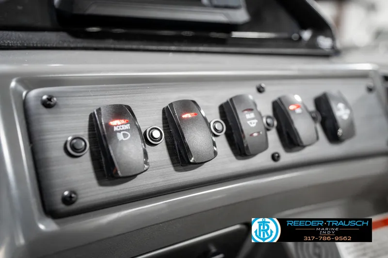 Slide: The Image of Control panel of 2025 Bennington 21 SSR boat with labeled switches. - 34