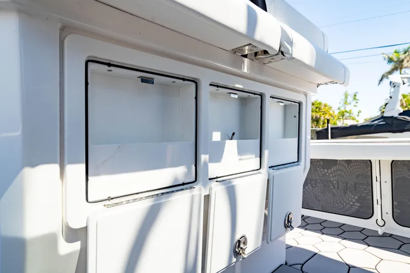 Slide: The Image of 2024 Crevalle 26 HCO boat storage compartments, featuring sleek design and ample space. - 37