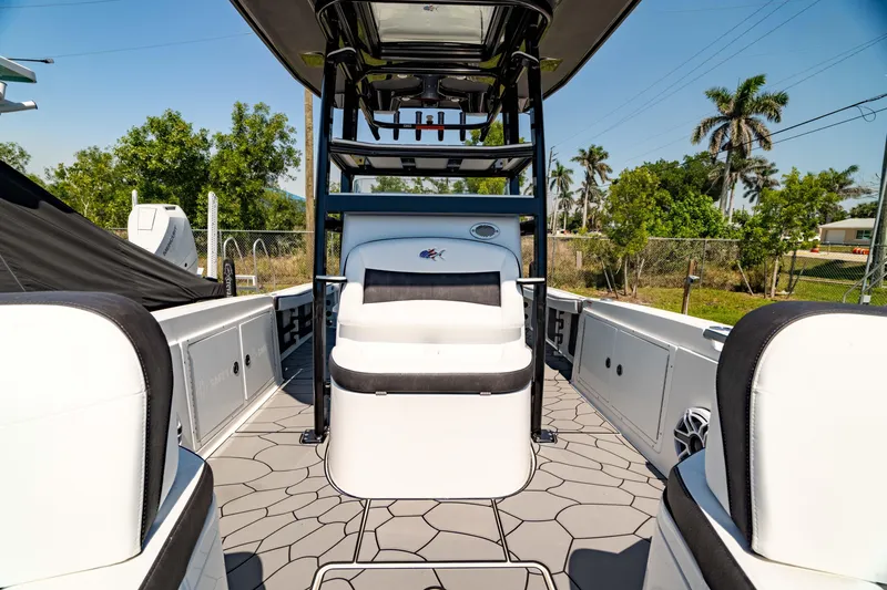 Slide: The Image of 2024 Crevalle 26 HCO boat interior with seating and modern design. - 47