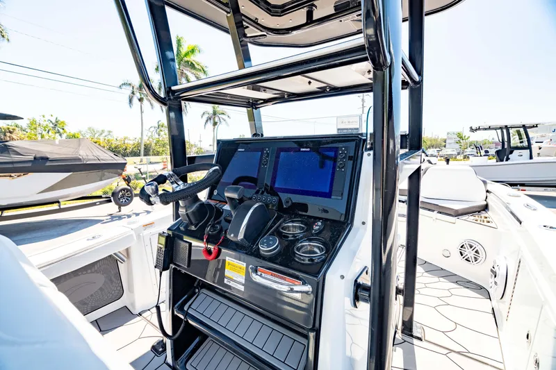 Slide: The Image of 2024 Crevalle 26 HCO boat console with advanced navigation systems and controls. - 7