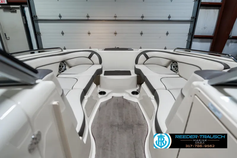 Slide: The Image of 2014 Yamaha Boats 242 Limited S interior with spacious seating and modern design. - 17
