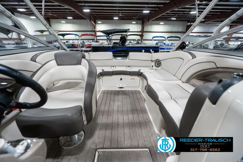 Slide: The Image of 2014 Yamaha Boats 242 Limited S interior with spacious seating and modern design. - 19