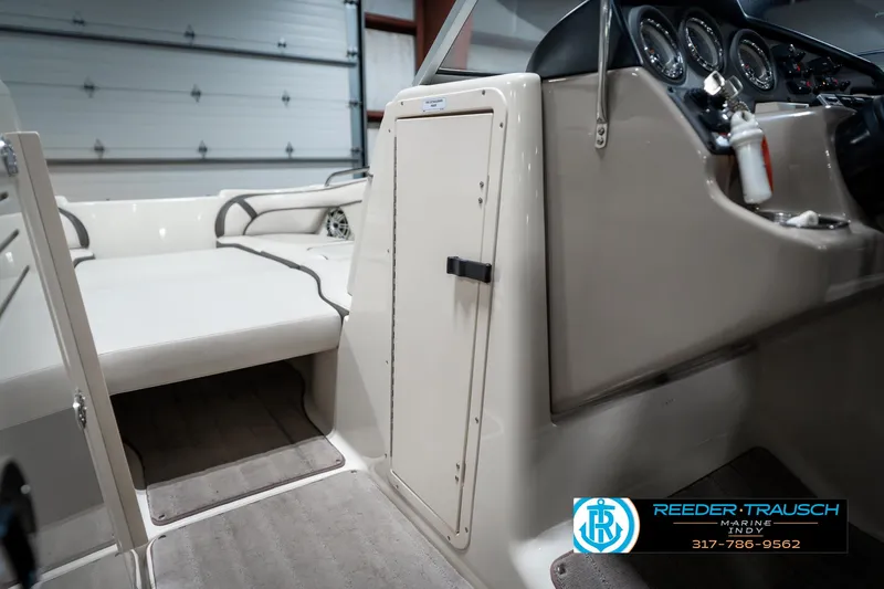 Slide: The Image of 2014 Yamaha Boats 242 Limited S interior with seating and control panel. - 25