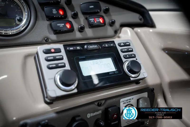Slide: The Image of Control panel of a 2014 Yamaha Boats 242 Limited S with Clarion audio system. - 37