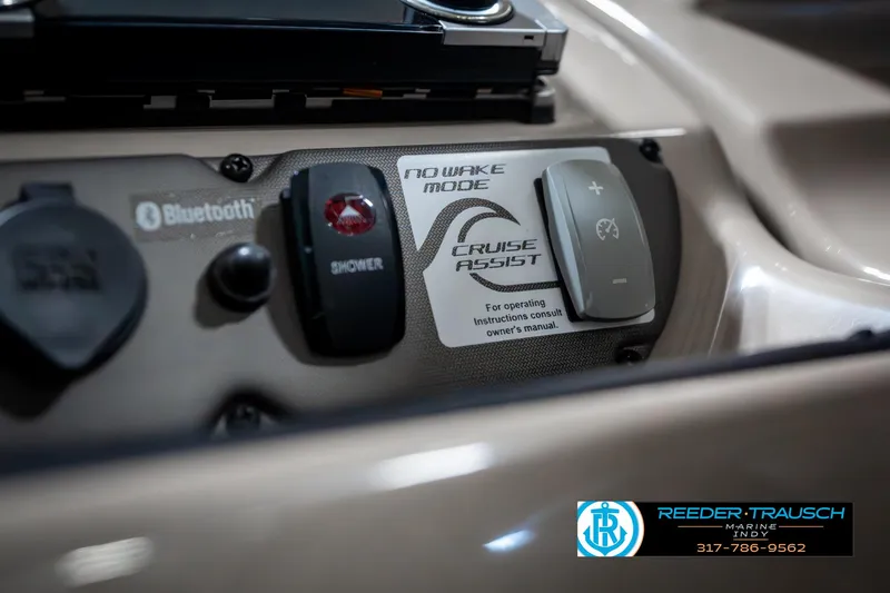 Slide: The Image of Control panel of 2014 Yamaha Boats 242 Limited S with Bluetooth and cruise assist features. - 39