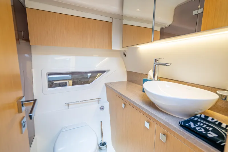 Slide: The Image of Modern bathroom in 2021 Skamander Monaco yacht with sleek fixtures and wooden cabinetry. - 16