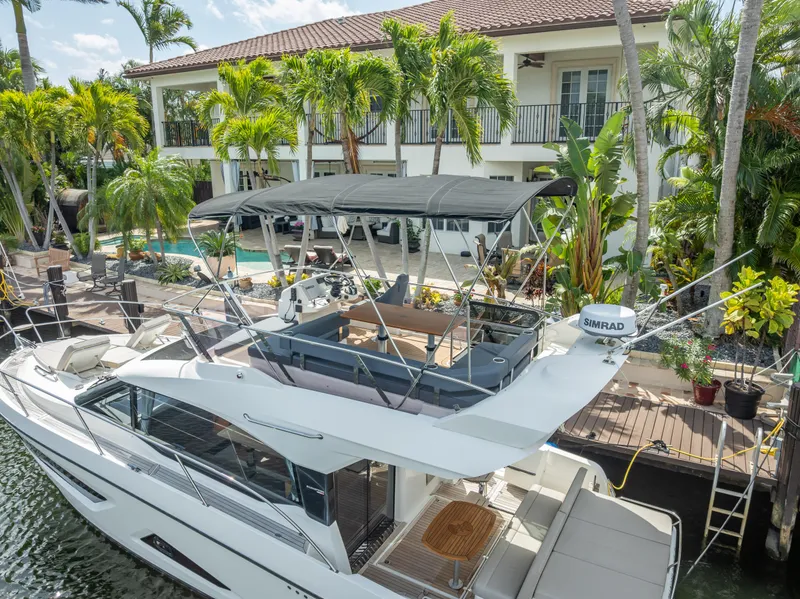 Slide: The Image of Luxury Skamander Monaco 2021 yacht docked by a tropical waterfront villa. - 37