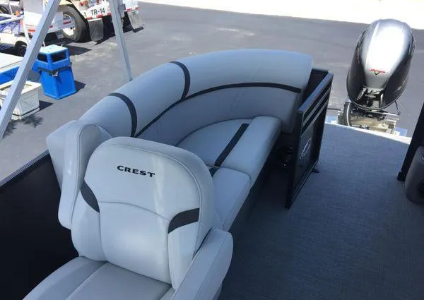 Slide: The Image of 2024 Crest LX 200 SLC boat interior with plush seating and modern design. - 20