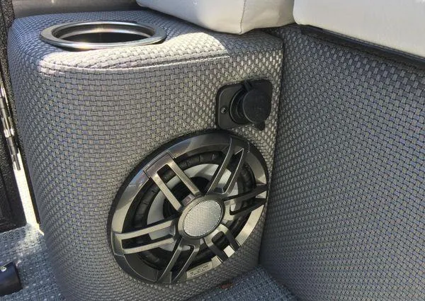 Slide: The Image of 2024 Crest LX 200 SLC boat interior with speaker and cup holder detail. - 9