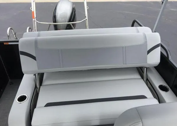 Slide: The Image of Dashboard of 2024 Crest Classic LX 220 SLSC boat with gauges and Lowrance display. - 13