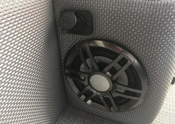 Slide: The Image of Speaker and outlet on 2024 Crest LX 220 SLRC boat's woven upholstery. - 8